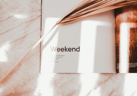 A sunlit magazine spread with soft shadows and delicate textures evokes a sense of relaxation.